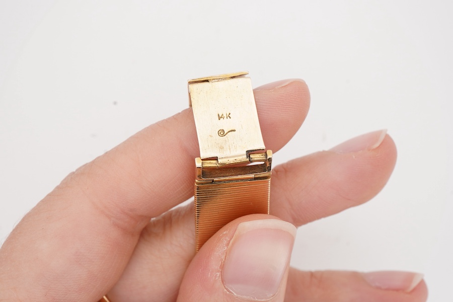 A gentleman's 1960's 14k Lucien Piccard manual wind wrist watch, with baton numerals and case back inscription, case diameter 27mm, on a damaged integral 14k bracelet.